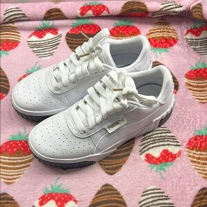 Puma women’s White Sneakers